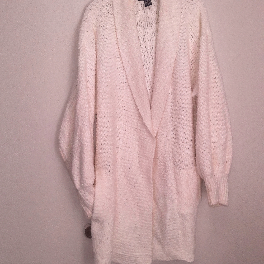 Big 100% Acrylic Mid thigh-length sweater.